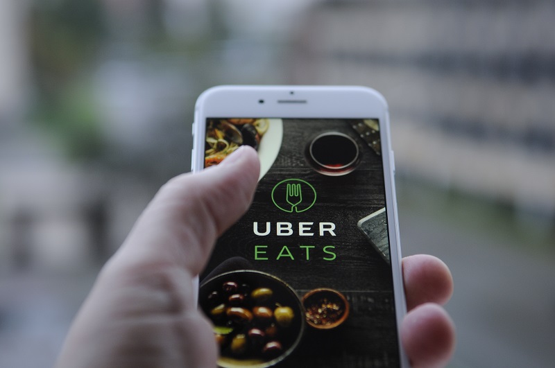 The Uber Eats app opening screen is seen on an iPhone