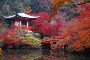 A Japanese pagoda situated next to a river