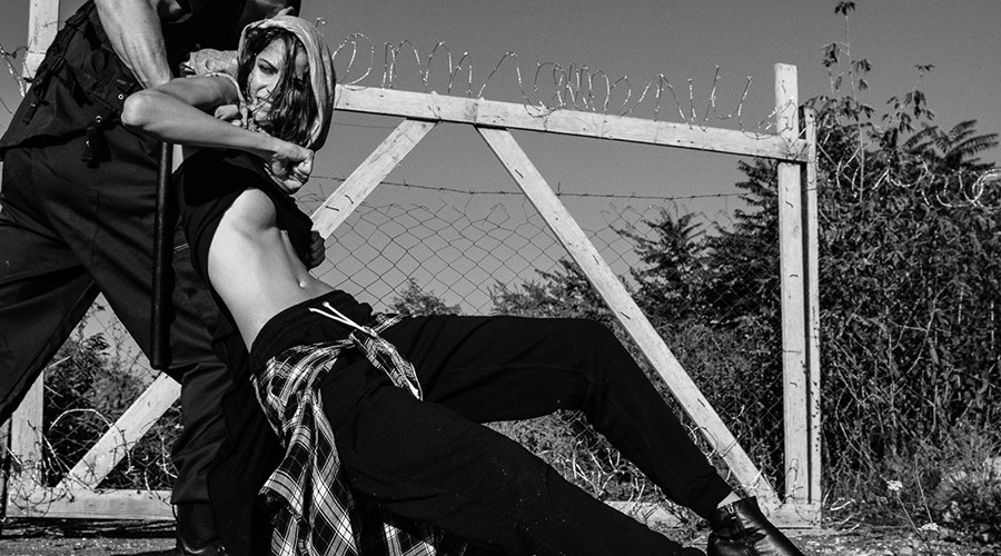 Hungarian fashion photographer Norbert Baksa has published a photo editorial called ‘Der Migrant’ featuring a model in designer clothes posing as a refugee by a barb-wired fence. Some viewers have called the project “utterly sick” and “wickedly wrong.”