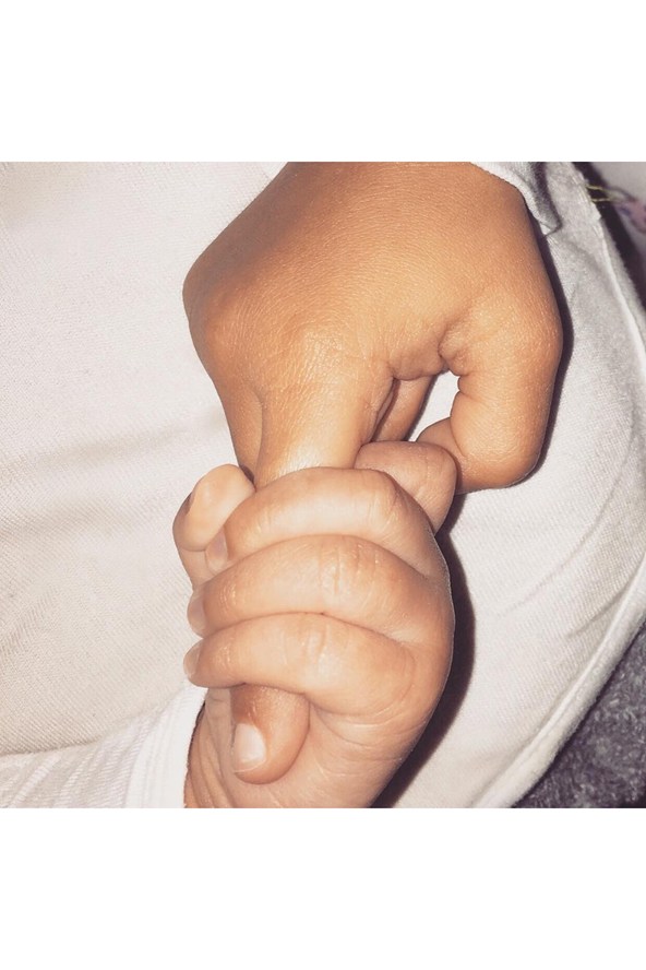 Kim Kardashian-West and husband Kanye West welcomed their baby boy Saint and shared this picture on Kim's Instagram account.