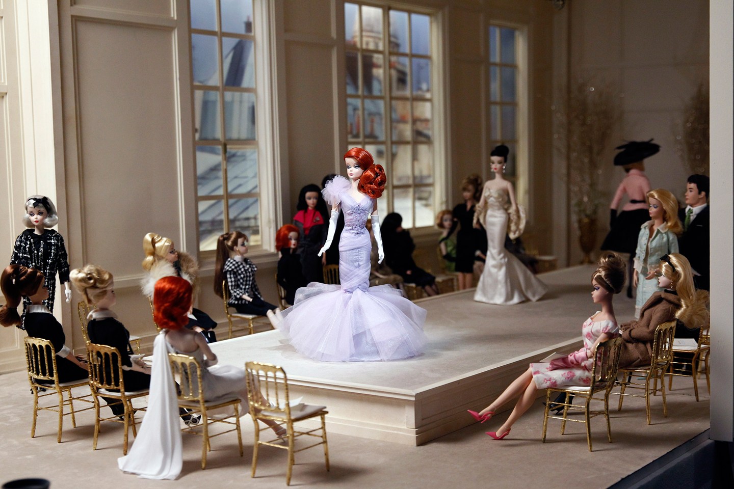 Barbie dolls are displayed at the Museum of Decorative Arts's exhibition Barbie, life of an icon, as part of Paris Fashion Week