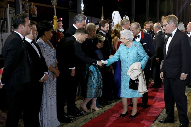 The Queen arrives with members of her family at Windsor Castle to celebrate her 90th birthday. 