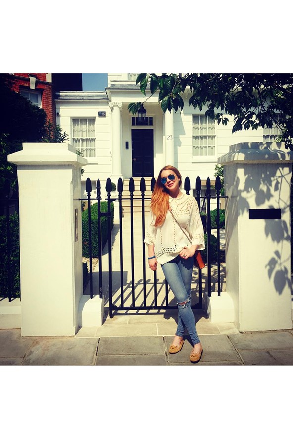 Lindsay Lohan revisits the London home at which the 1998 film The Parent Trap was shot. The actress, who played twin sisters Hallie and Annie, captioned the photograph: 