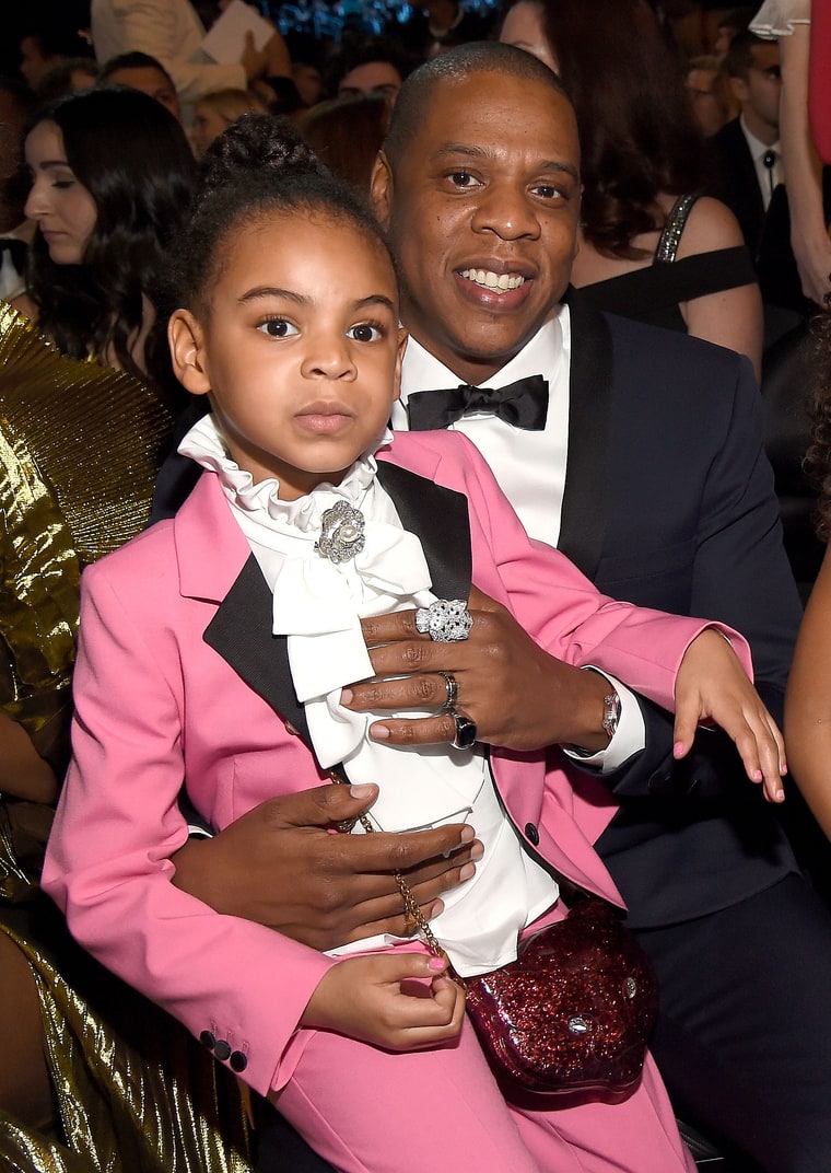 Blue Ivy Carter was the centre of attention at the Grammys, looking adorbs in a pink Gucci suit (which may or may not have been a Prince  reference).  She accessorised with a pink Gucci cat purse.  
