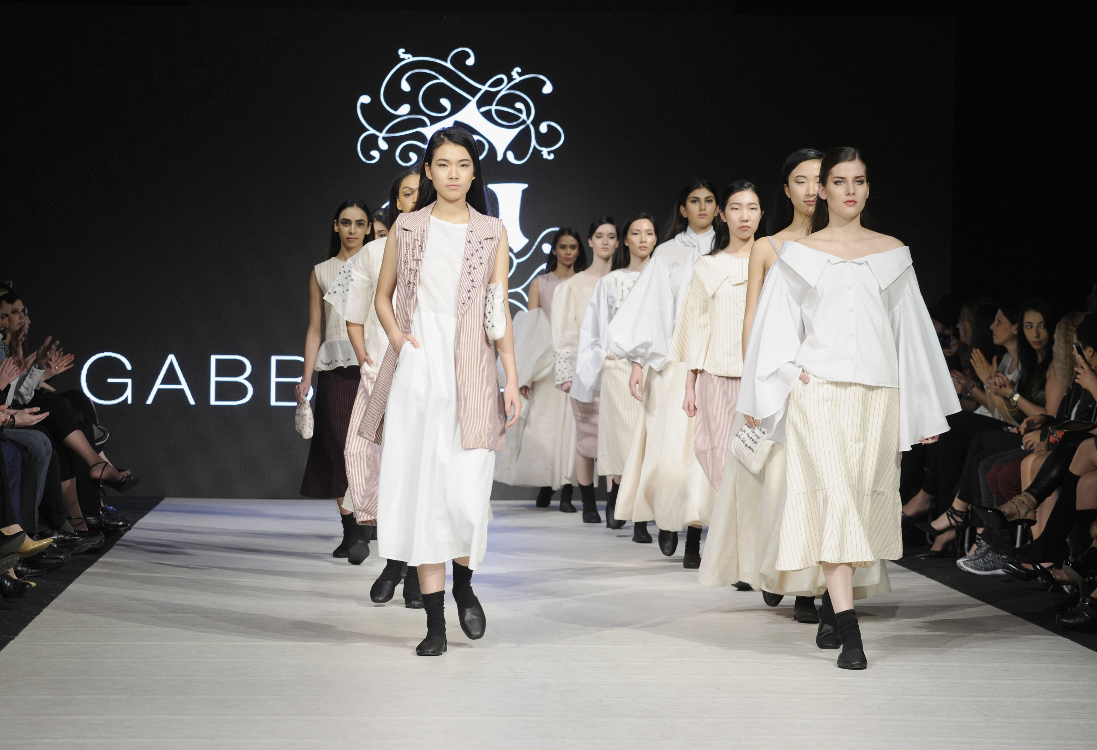 VANCOUVER, BC - MARCH 23:  Models walk the runway wearing Gabbie Sarenas at Vancouver Fashion Week Fall/Winter 2017 at Chinese Cultural Centre of Greater Vancouver on March 23, 2017 in Vancouver, Canada.  (Photo by Arun Nevader/WireImage)