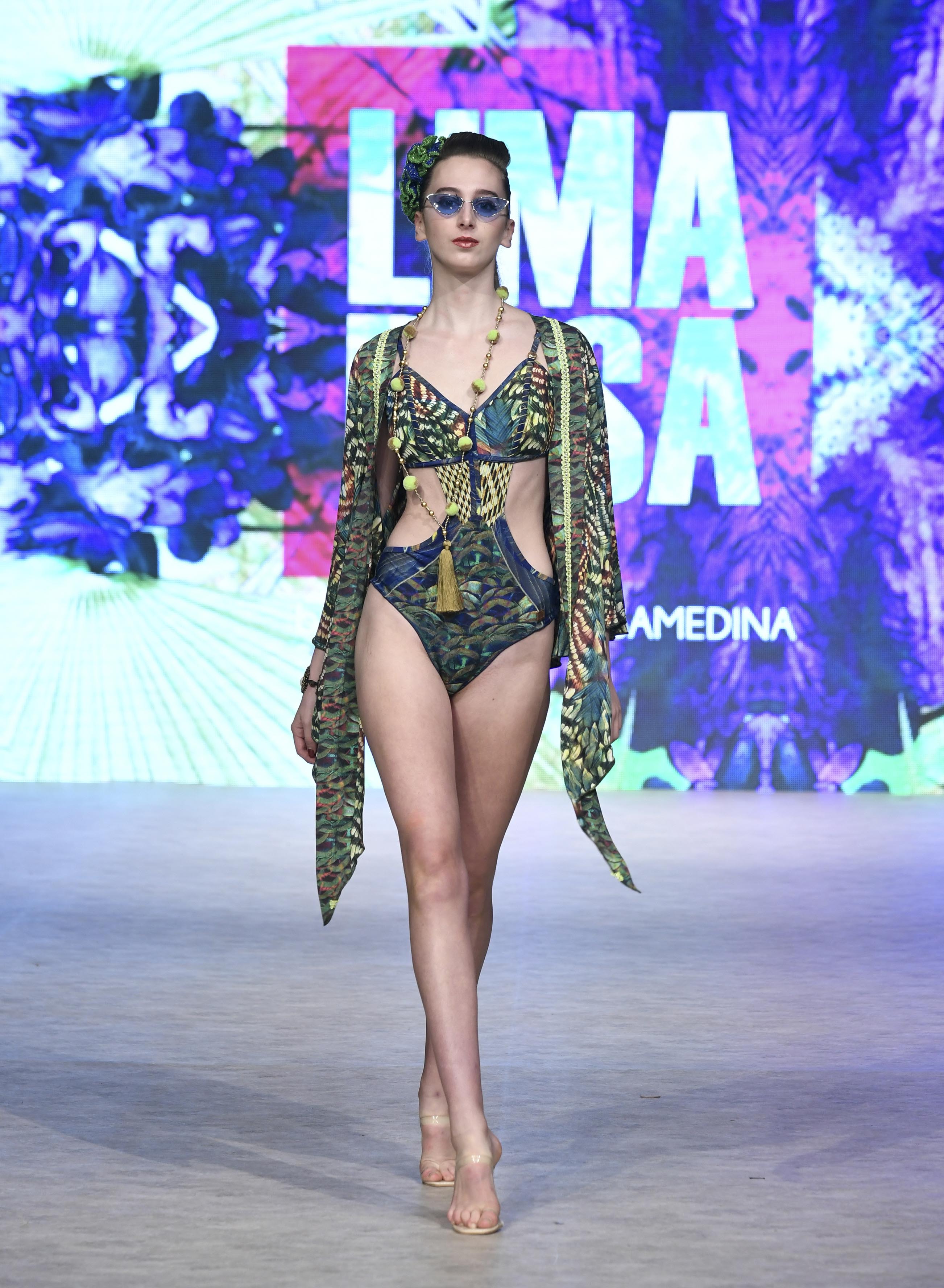 VANCOUVER, BC - SEPTEMBER 18:  A model walks the runway wearing Lima Rosa at Vancouver Fashion Week Spring/Summer 19 - Day 2 on September 18, 2018 in Vancouver, Canada.  (Photo by Arun Nevader/Getty Images for VFW Management INC)