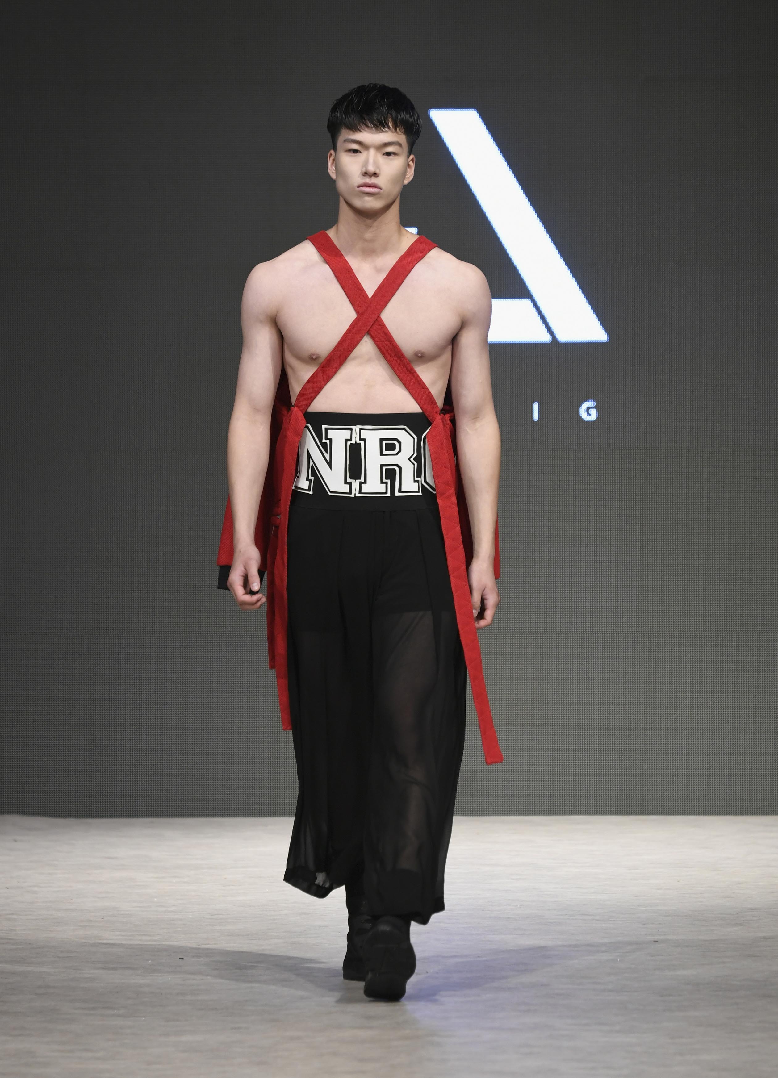 VANCOUVER, BC - SEPTEMBER 21:  A model walks the runway wearing JNORIG at Vancouver Fashion Week Spring/Summer 19 - Day 5 on September 21, 2018 in Vancouver, Canada.  (Photo by Arun Nevader/Getty Images for VFW Management INC)