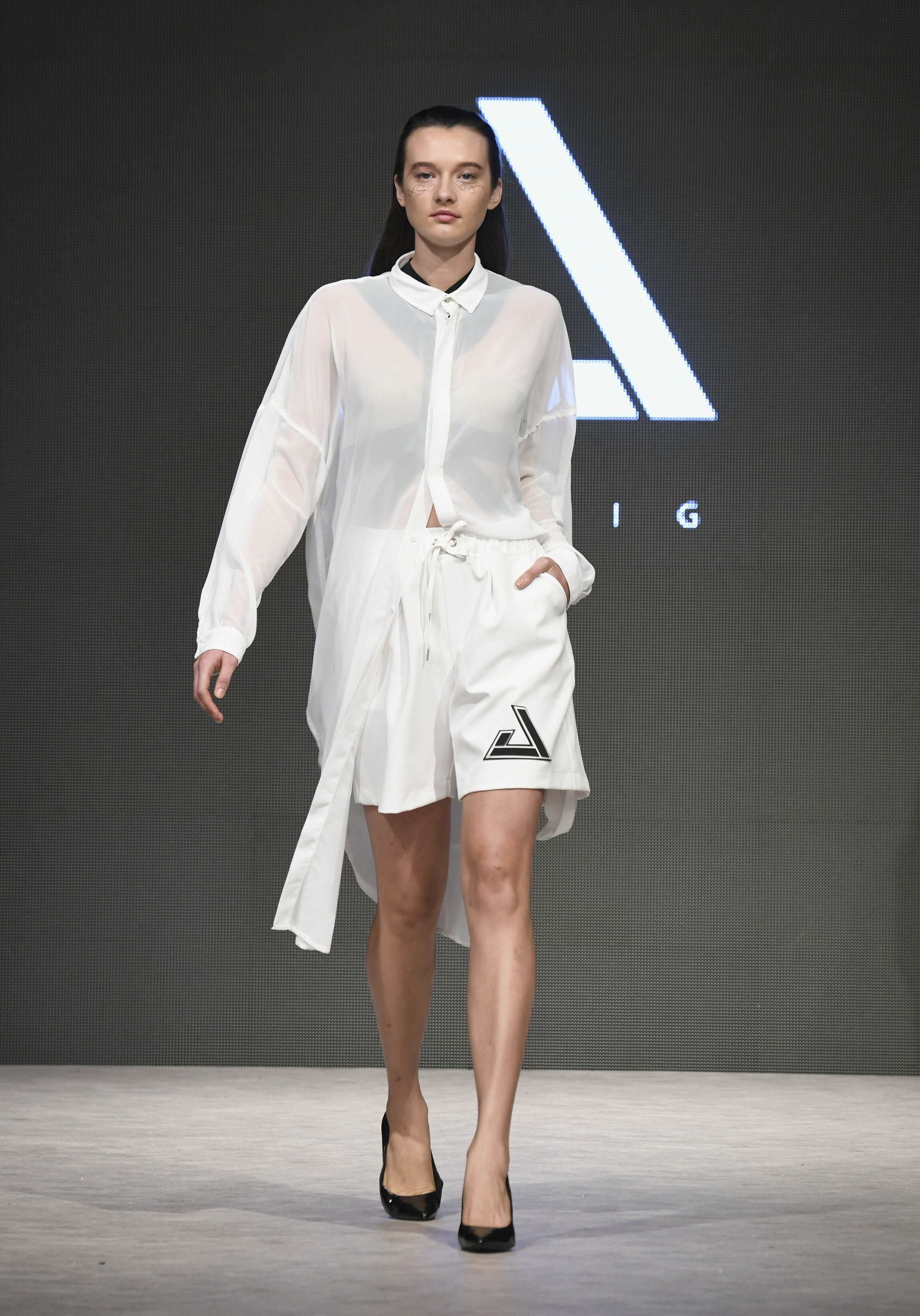 VANCOUVER, BC - SEPTEMBER 21:  A model walks the runway wearing JNORIG at Vancouver Fashion Week Spring/Summer 19 - Day 5 on September 21, 2018 in Vancouver, Canada.  (Photo by Arun Nevader/Getty Images for VFW Management INC)