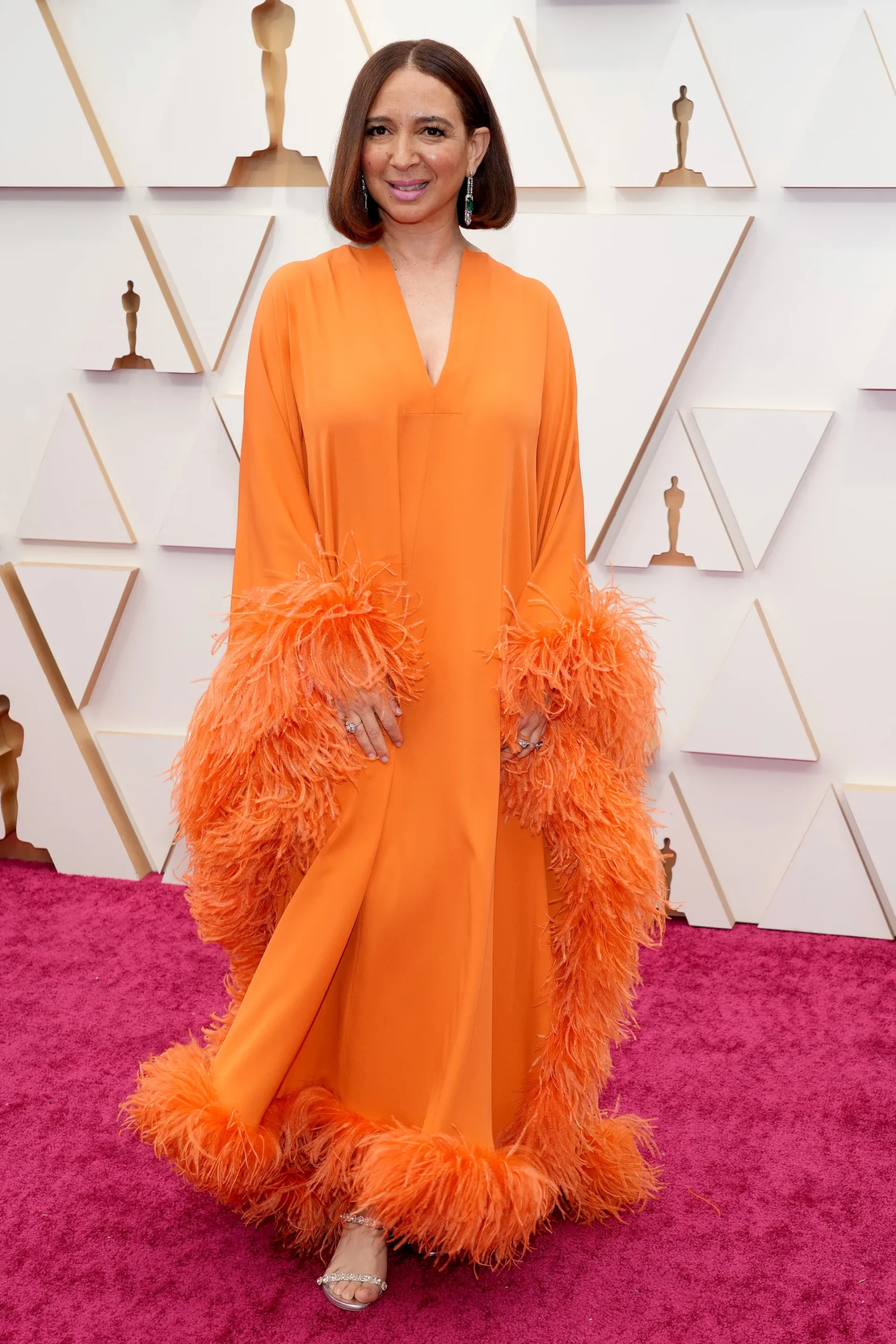 Maya Rudolph in gorgeous orange feathered gown