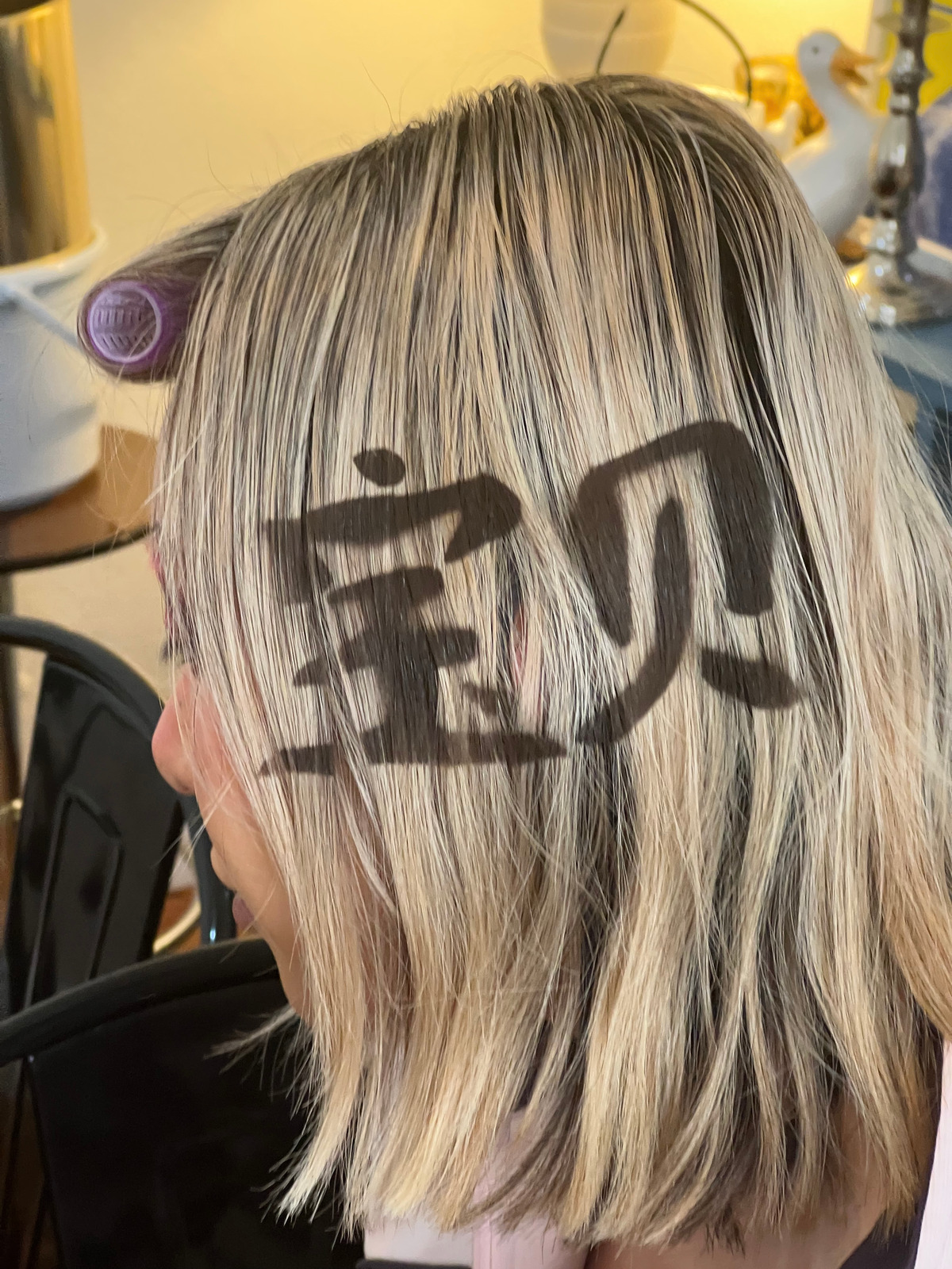 Chinese Characters Sprayed on Hair