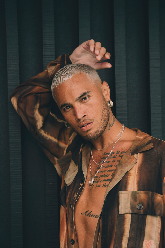 Stan walker poses with new fragrance Human