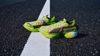 Fast-R 2 NITRO elite Psychedelic Rush shoes laying on asphalt.