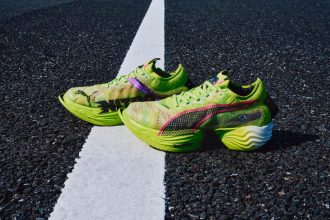 Fast-R 2 NITRO elite Psychedelic Rush shoes laying on asphalt.